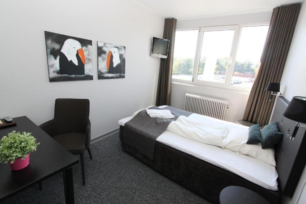 Banegaardshotellet Vojens ภายนอก รูปภาพ