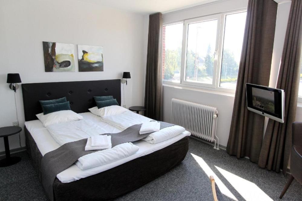 Banegaardshotellet Vojens ภายนอก รูปภาพ